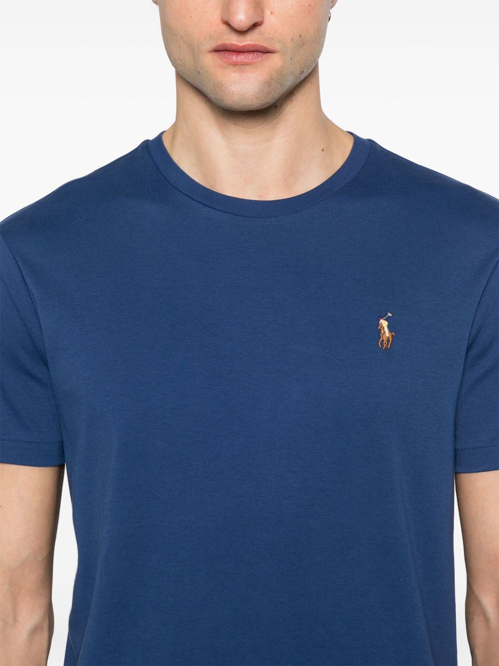 Polo  talla XL y L azul claro
